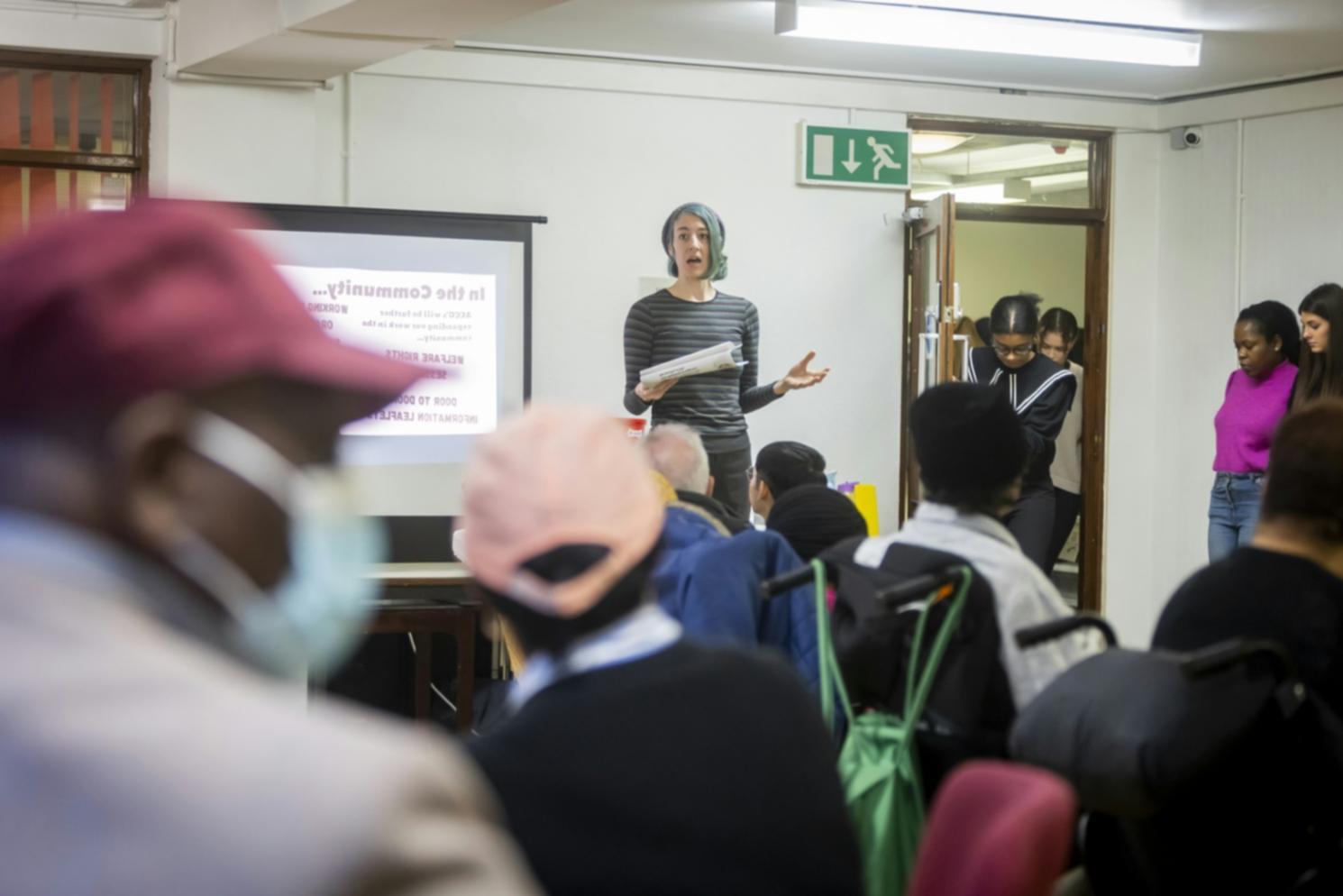 Financial consultation session with documents and calculator