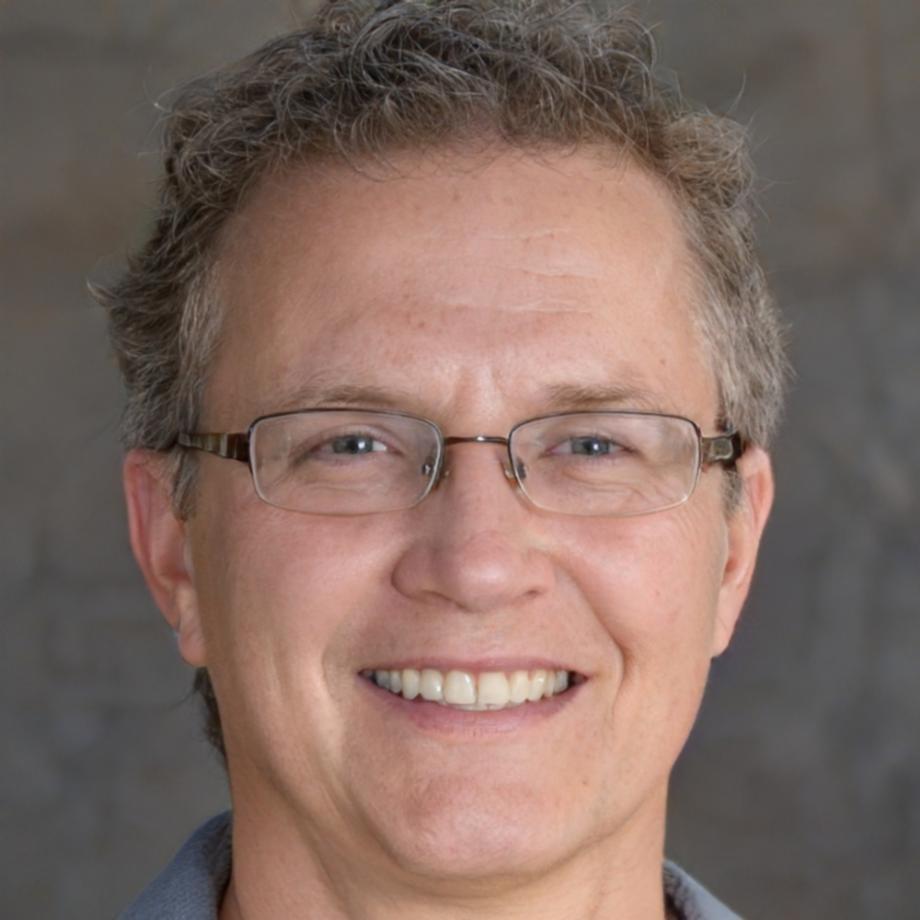 Professional headshot of male instructor specializing in personal finance education